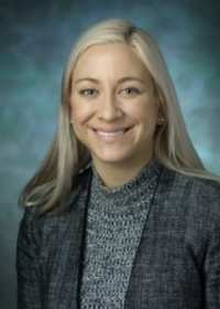 Dr. Carrie A. Houssock, MD